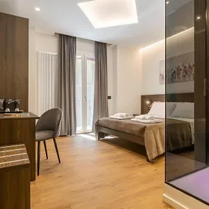 Quinto Stabile Rooms&suite Couette-café